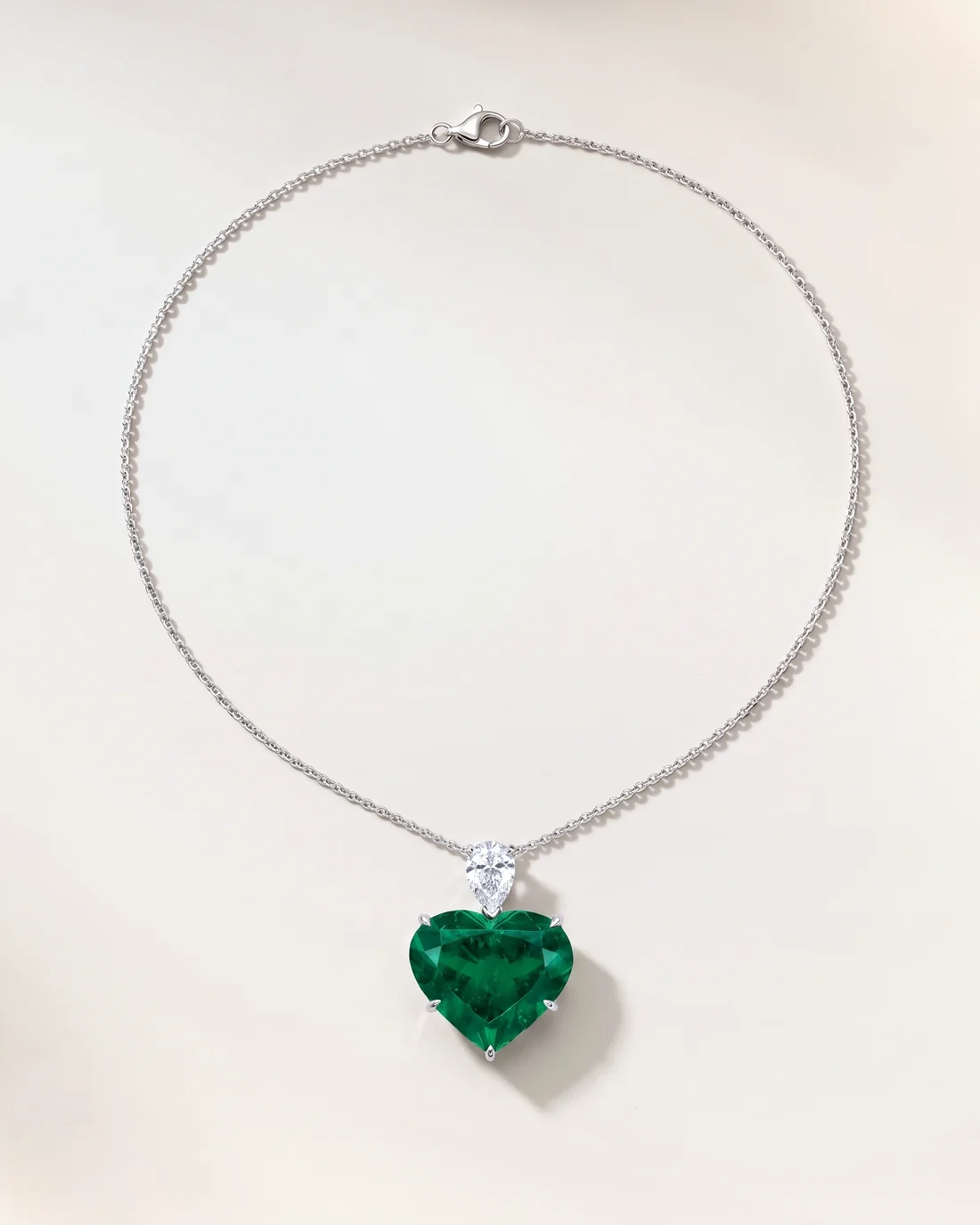 ORTIGAS Emerald Heart Drop necklace, front view