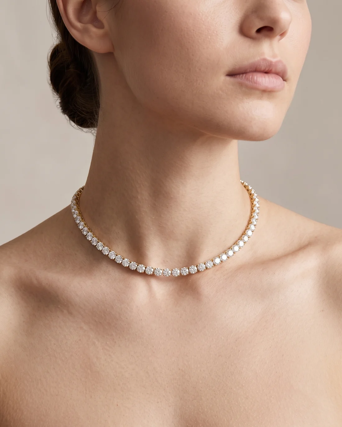 ORTIGAS Gold Riviere Choker necklace, worn on the neck