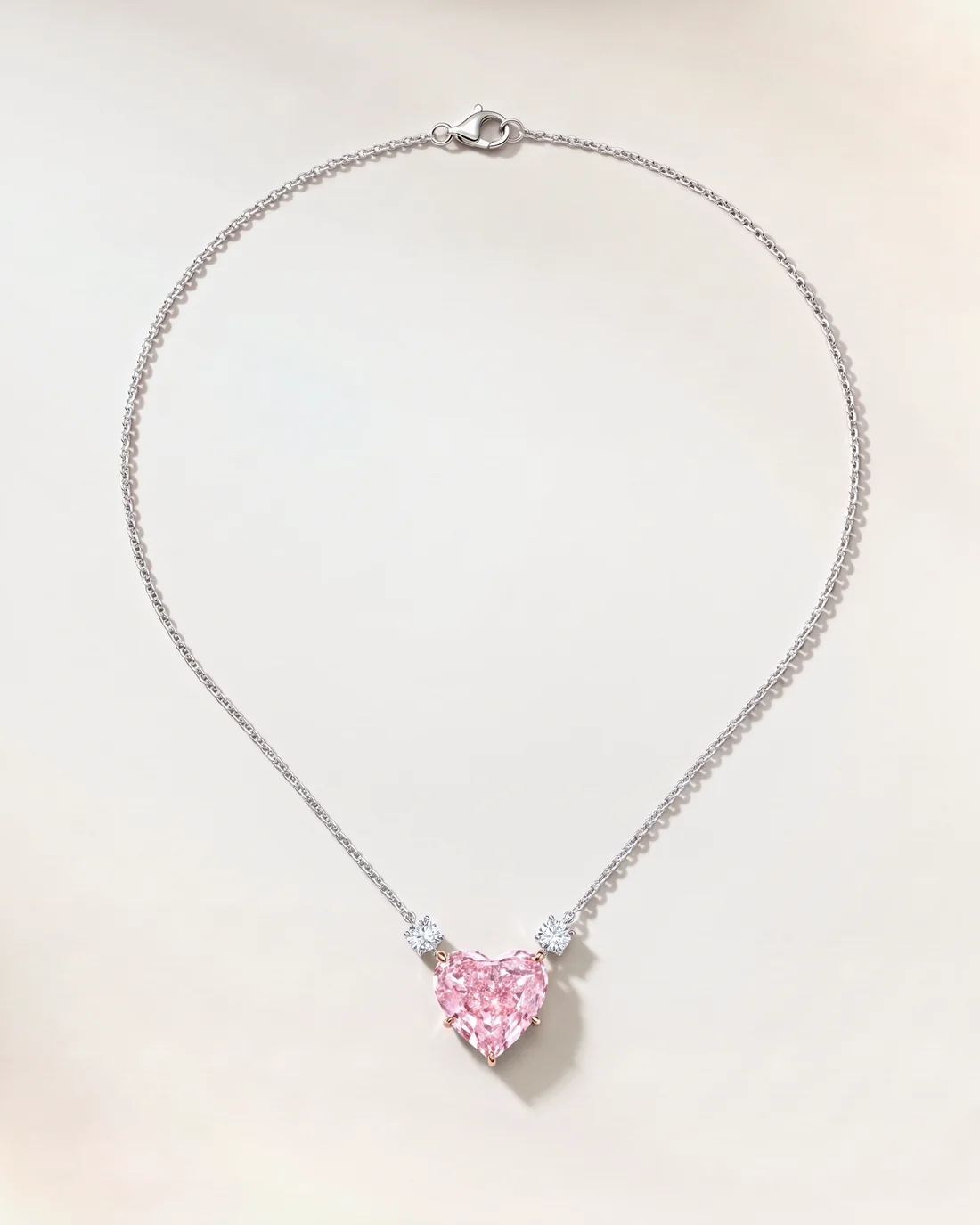 ORTIGAS Pink Heart Trio necklace, front view