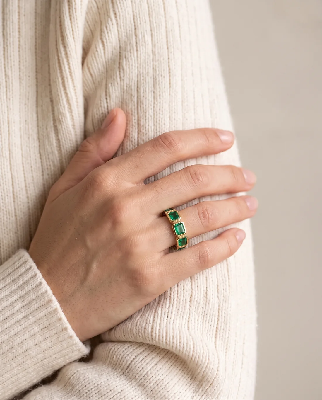 ORTIGAS Emerald Bezel Band ring, worn on the hand