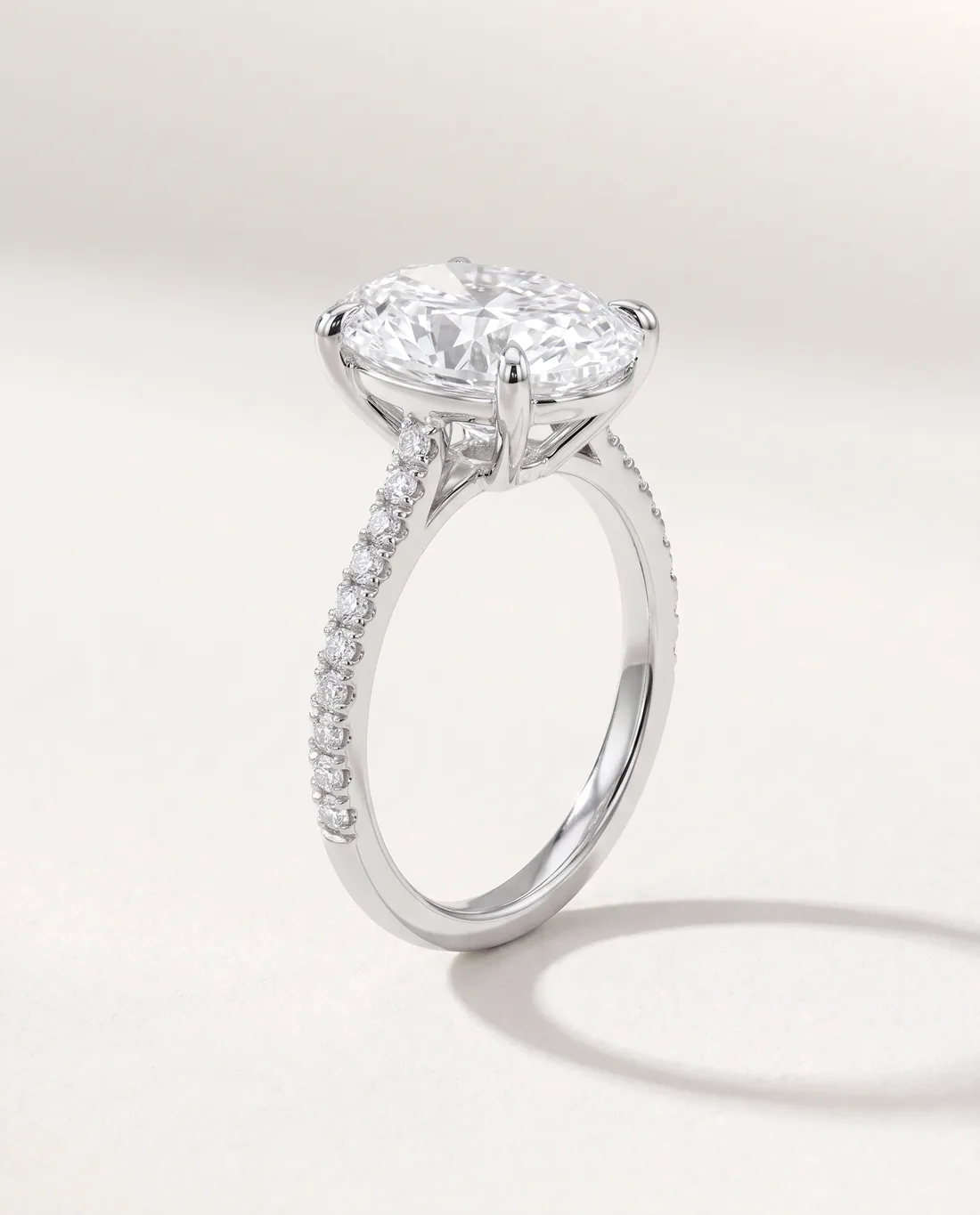 ORTIGAS Oval solitaire ring, three-quarter view