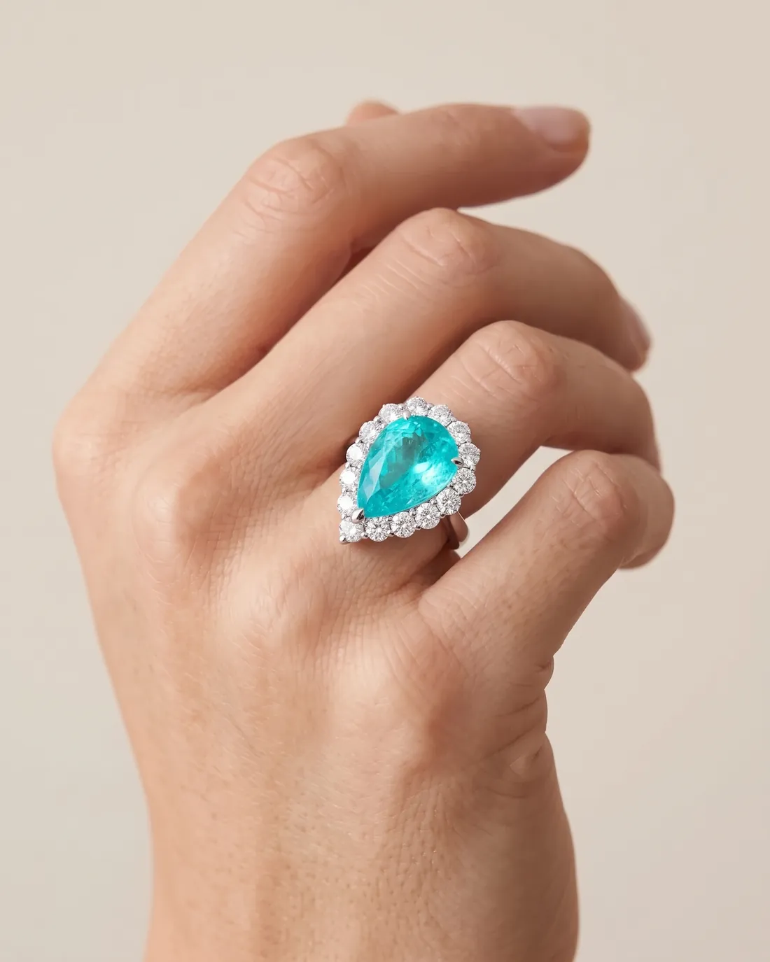 ORTIGAS Paraiba Pear ring, worn on the hand