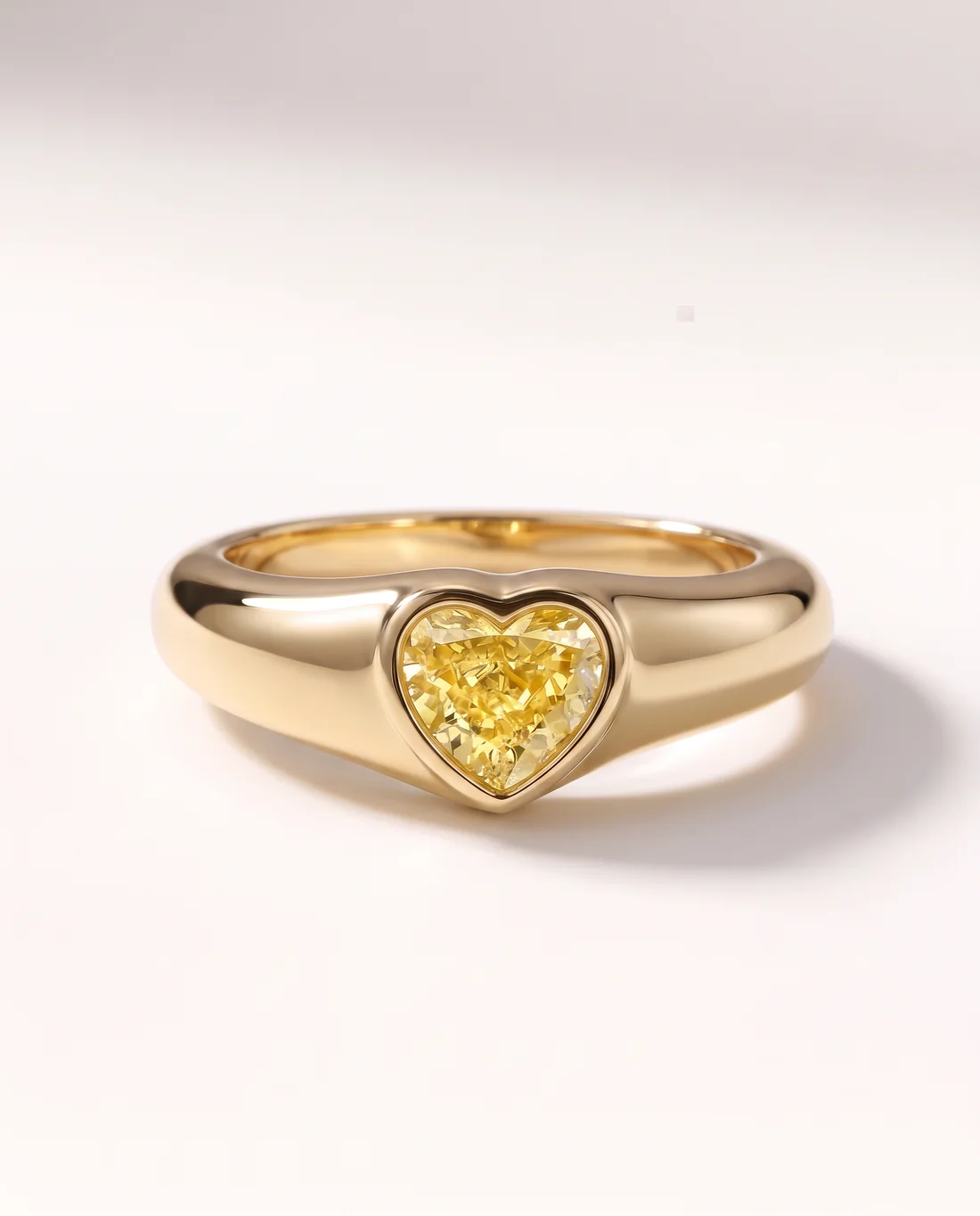 ORTIGAS Yellow Heart Signet ring, front view
