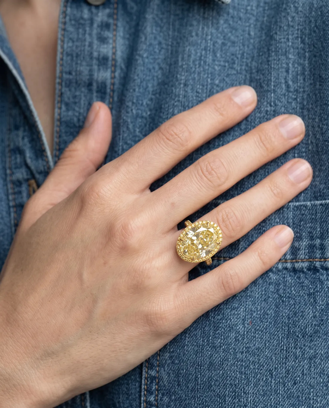 ORTIGAS Yellow Oval Halo ring, worn on the hand